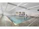 Indoor swimming pool with clear water, tiled deck, and bright lighting at 1800 Clairmont #428 Lk # A428, Decatur, GA 30033