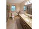 Bathroom featuring a granite countertop vanity, tiled floor, and glass-enclosed shower at 3743 Wyntuck Nw Cir, Kennesaw, GA 30152