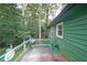Deck features a grill, stool, and view of backyard trees at 3743 Wyntuck Nw Cir, Kennesaw, GA 30152