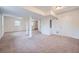 Unfinished basement offers room to grow with neutral carpet and bright natural light at 4089 Menlo Dr, Tucker, GA 30084