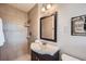 Bathroom features tiled shower, vanity and updated fixtures at 4089 Menlo Dr, Tucker, GA 30084