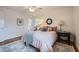 Cozy bedroom with ceiling fan, area rug and ensuite bathroom at 4089 Menlo Dr, Tucker, GA 30084