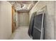 Unfinished basement area with exposed ceiling, concrete walls, and a collection of screens at 4987 Day Lily Nw Way, Acworth, GA 30102