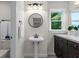 Bathroom with updated lighting and modern fixtures at 4987 Day Lily Nw Way, Acworth, GA 30102