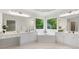 Bright bathroom features double sinks, granite counters, and a soaking tub at 4987 Day Lily Nw Way, Acworth, GA 30102