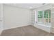 Bedroom featuring built-in shelving and natural light at 4987 Day Lily Nw Way, Acworth, GA 30102