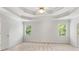 Spacious bedroom featuring neutral carpeting and two bright windows at 4987 Day Lily Nw Way, Acworth, GA 30102