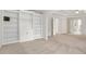 Bedroom featuring built-in shelving and an arched entryway to another room at 4987 Day Lily Nw Way, Acworth, GA 30102