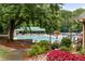 Inviting community pool surrounded by lush landscaping and lounge chairs at 4987 Day Lily Nw Way, Acworth, GA 30102