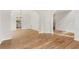 Spacious dining room with hardwood floors, white walls, and elegant wainscoting at 4987 Day Lily Nw Way, Acworth, GA 30102