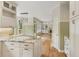 A modern kitchen with an island that opens up to the dining and living areas at 4987 Day Lily Nw Way, Acworth, GA 30102