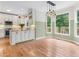 Eat-in kitchen features stainless steel appliances and an adjacent breakfast nook at 4987 Day Lily Nw Way, Acworth, GA 30102
