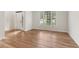 Spacious room with hardwood floors and abundant natural light from large windows at 4987 Day Lily Nw Way, Acworth, GA 30102
