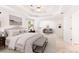 Luxurious main bedroom with a sitting area and neutral decor at 4987 Day Lily Nw Way, Acworth, GA 30102