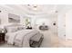 Bright main bedroom boasts trey ceilings, sitting area, and neutral decor at 4987 Day Lily Nw Way, Acworth, GA 30102