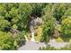 Desirable home surrounded by mature trees and lush greenery in a serene and private neighborhood at 592 Ferry Creek Ct, Acworth, GA 30102