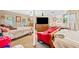 Spacious bedroom with multiple beds and large screen television at 592 Ferry Creek Ct, Acworth, GA 30102