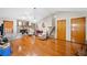 Large living room with hardwood floors and stone fireplace at 592 Ferry Creek Ct, Acworth, GA 30102