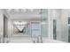 Luxurious bathroom with double sinks and glass shower at 6313 Shoreland Cir, Buford, GA 30518