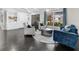 Cozy living room with a sleek round coffee table and built-in bookshelves at 6313 Shoreland Cir, Buford, GA 30518