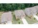 Aerial view of a well-maintained home with manicured lawn and a two car garage at 2870 Prestwood Dr, Cumming, GA 30040