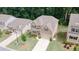 Expansive aerial view of a well-maintained brick home with long driveway, mature trees, and neighboring houses at 2870 Prestwood Dr, Cumming, GA 30040