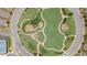 Overhead shot highlights the winding walkway through the park, creating a tranquil green space at 2870 Prestwood Dr, Cumming, GA 30040