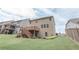 Green backyard showcasing a wooden deck and stairs providing easy access to outdoor living spaces at 2870 Prestwood Dr, Cumming, GA 30040
