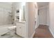 Cozy bathroom features a combined shower-tub, granite countertop, and storage space at 2870 Prestwood Dr, Cumming, GA 30040