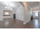 Elegant dining area showcasing hardwood floors, wainscoting, a chandelier, and an alcove with built-in cabinets at 2870 Prestwood Dr, Cumming, GA 30040