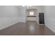 Elegant dining area showcasing hardwood floors, wainscoting, a chandelier, and an alcove with built-in cabinets at 2870 Prestwood Dr, Cumming, GA 30040