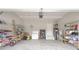 Spacious garage with storage racks, water heater, freezer and bike at 2870 Prestwood Dr, Cumming, GA 30040