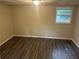 Basement featuring vinyl floors and light from a window at 4902 Pine Hill E Ct, Stone Mountain, GA 30088
