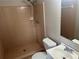 Bathroom featuring a tiled shower and sink at 4902 Pine Hill E Ct, Stone Mountain, GA 30088