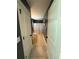 Bright bathroom featuring a shower, vanity, and neutral tile flooring at 8340 Nolandwood Ln, Villa Rica, GA 30180