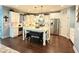 Bright kitchen featuring stainless steel appliances, a large island, and white cabinetry at 8340 Nolandwood Ln, Villa Rica, GA 30180