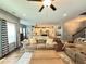 Open-concept living room featuring hardwood floors and natural light at 8340 Nolandwood Ln, Villa Rica, GA 30180