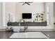 Modern kitchen sink with a stainless steel faucet, garden decor and living room view at 1408 Chloe Dr, Lawrenceville, GA 30043