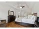 Tranquil main bedroom featuring a plush bed, elegant decor, and ample space at 1408 Chloe Dr, Lawrenceville, GA 30043