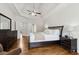 Spacious main bedroom features hardwood floors, tray ceilings, and ample natural light at 1408 Chloe Dr, Lawrenceville, GA 30043