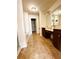 Bright bathroom features a double vanity, large mirror, and a separate toilet room at 4438 Lassen Ct, Suwanee, GA 30024
