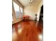 Bright dining area with natural light from large windows and view of kitchen at 4438 Lassen Ct, Suwanee, GA 30024