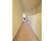 Carpeted hallway on the second floor leading to additional rooms with modern finishes at 4438 Lassen Ct, Suwanee, GA 30024