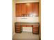 Office area with a desk, cabinets, and a carpeted floor at 4438 Lassen Ct, Suwanee, GA 30024