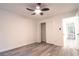 Cozy bedroom with neutral paint, ceiling fan, and closet, creating a comfortable and inviting space at 69 N Hearn Rd, Ellenwood, GA 30294