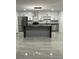 Modern kitchen with an island, stainless steel appliances, and bright white cabinets at 69 N Hearn Rd, Ellenwood, GA 30294