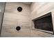 Modern shower featuring sleek fixtures, and a convenient built-in shelf for enhanced functionality at 69 N Hearn Rd, Ellenwood, GA 30294