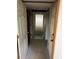 A view down a long hallway of a basement space at 71 Southern Golf Ct, Fayetteville, GA 30215