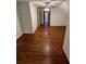 Open bedroom with hard wood floors, ceiling fan, and plenty of space at 71 Southern Golf Ct, Fayetteville, GA 30215