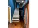 Inviting entryway with hardwood floors and staircase leading to the upper level at 71 Southern Golf Ct, Fayetteville, GA 30215